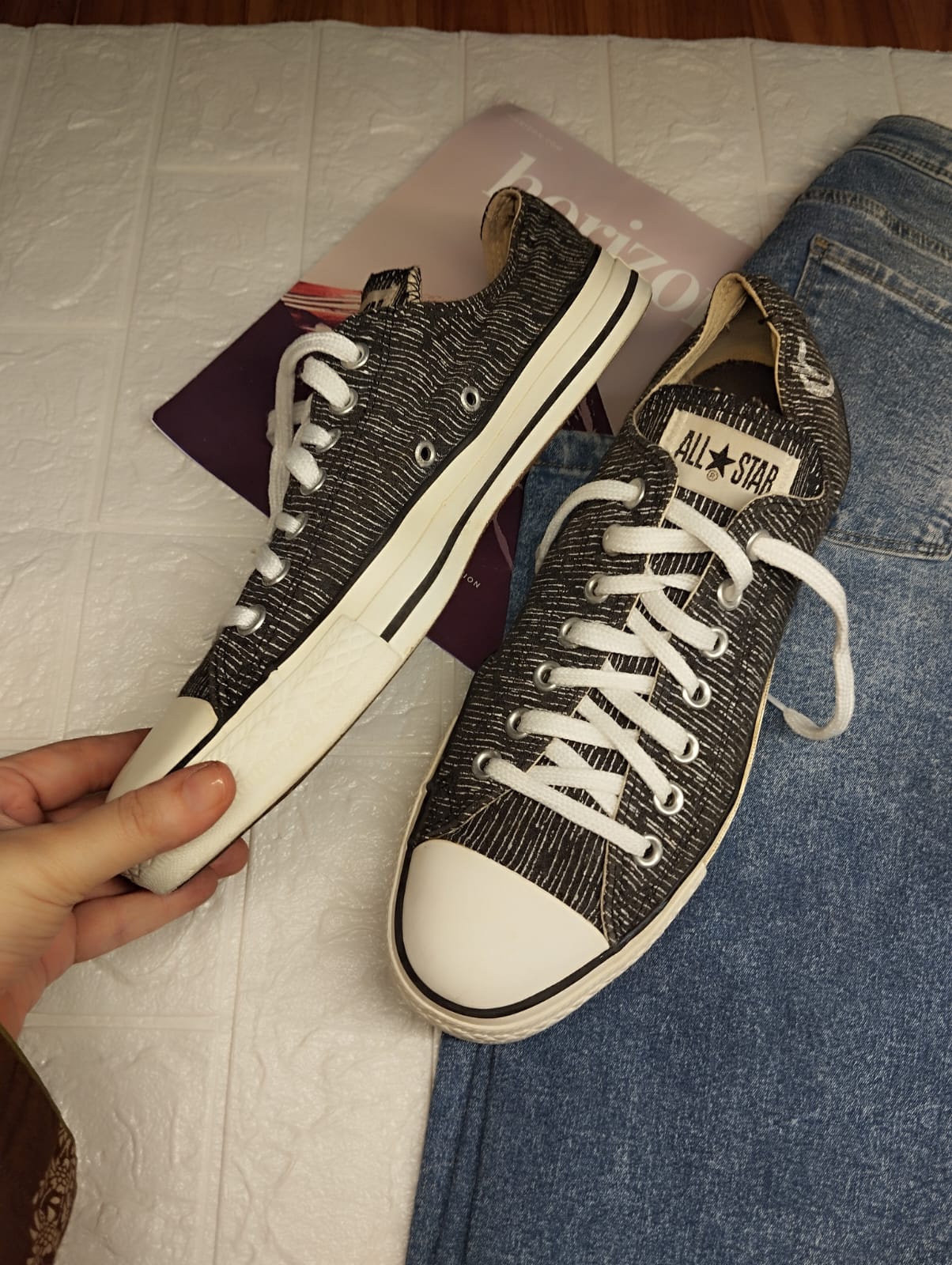 Black textured low rise converse